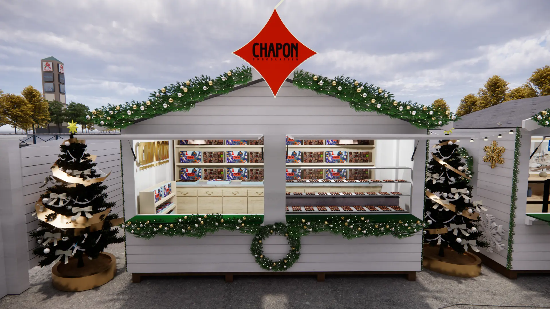 Le chalet Chapon Chocolatier et ses vitrines de chocolats, vu de jour